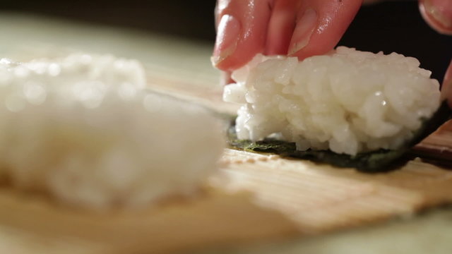Cooking sushi roll. Macro shot.