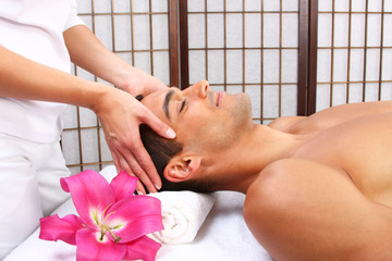 Young man receiving massage