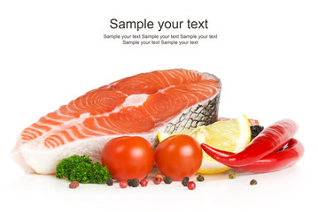 Salmon steak with lemon, pepper and parsley