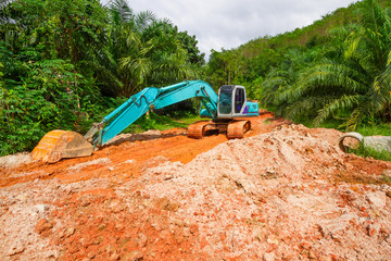 Digger in the tropical jungle of Thailand