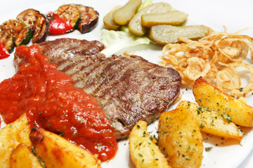 Grilled steak with vegetables