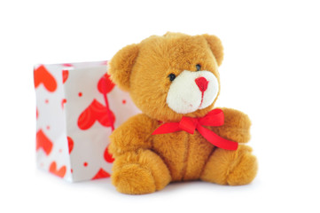 Teddy bear and paper bag with hearts