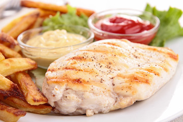 grilled meat with vegetable, and french fries