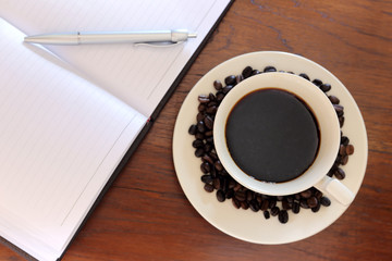 coffee cup with note book
