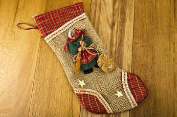 Epiphany sock decorated with old woman's .Befana