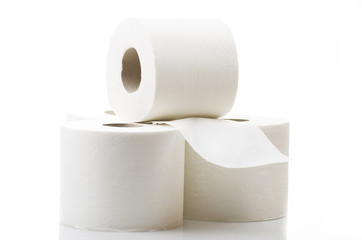Rolls of toilet paper close up on white