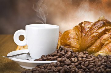 Coffee smoking on the coffee beans background