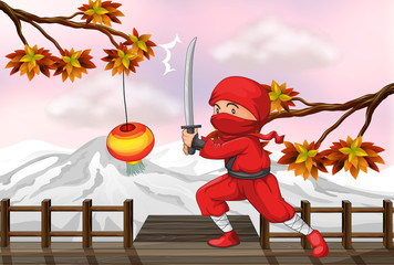 A red ninja with a sword at the wooden bridge © GraphicsRF