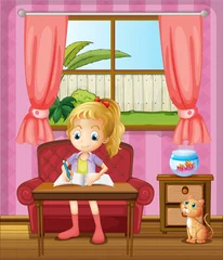Poster Een meisje dat in huis schrijft met een kat © GraphicsRF