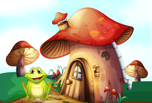 A green frog near a mushroom house