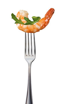 Gamba mit Ruccola auf Gabel