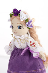 Pretty stuffed blonde doll portrait.