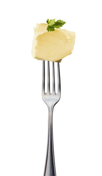 Butter mit Petersilie auf Gabel