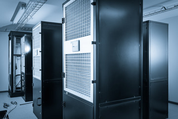 server cabinets inside data center room