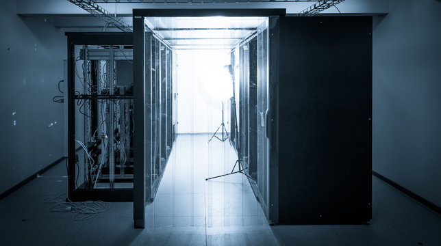 server cabinets inside data center room