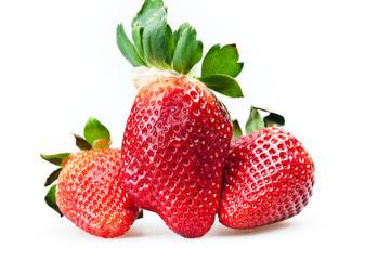 few ripe strawberries isolated on white background