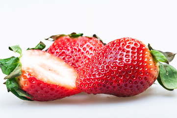 sweet strawberries isolated on white background