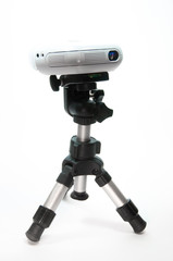 Mini-projector on a small tripod