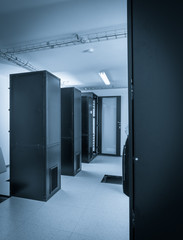 server cabinets inside data center room