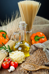 The composition of the pasta and vegetables on background