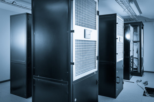 server cabinets inside data center room