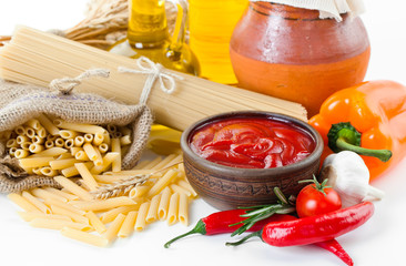 The composition of the pasta and vegetables on background