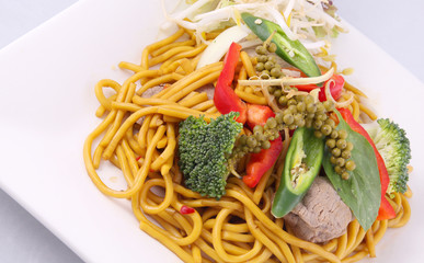 Hokkien noodles stir fried with Thai herb.