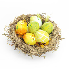 Decorated eggs for Easter in a nest