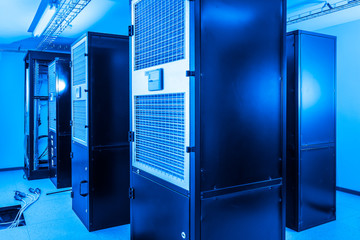 server cabinets inside data center room