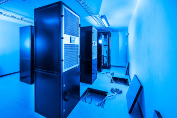 server cabinets inside data center room