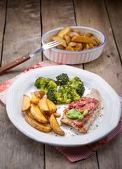 meat with potatoes and broccoli