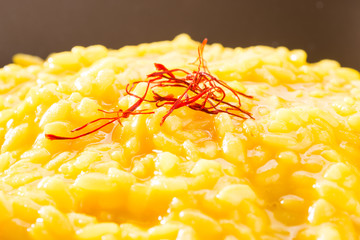 Risotto allo zafferano - Saffron rice, closeup