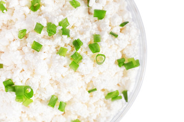 Fresh cottage cheese (curd) in glass bow, isolated on white back