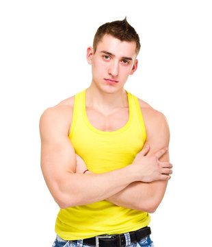 portrait of young beautiful man in yellow t-shirt