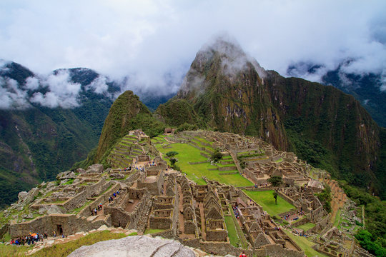 Tourist at Lost City of Machu Picchu - Peru