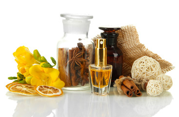 Bottles with ingredients for the perfume, isolated on white