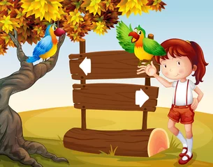 Rugzak Een jong meisje en haar papegaaien naast het uithangbord © GraphicsRF