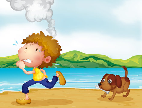 A boy running with his dog