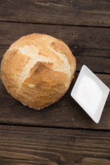 Bread on wood with salt