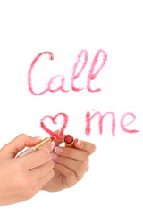 Inscription lipstick on mirror