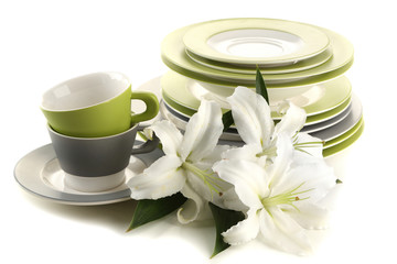Empty bowls, plates and cups isolated on white