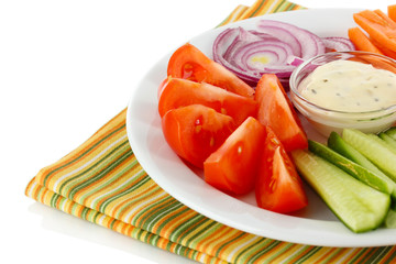 Assorted raw vegetables sticks in plate isolated on white