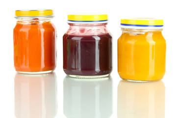 Baby puree in jars isolated on white