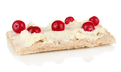 Crispbread with cheese and cranberry, isolated on white