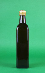 Fototapeta premium OLIVE OIL WITH OLDEN CAP