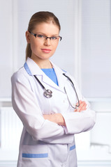 Portrait of Attractive Blonde Woman Doctor Looking at the Camera