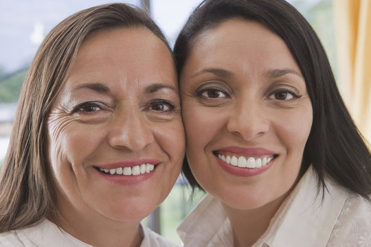 Hispanic mother and adult daughter