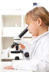Girl with microscope