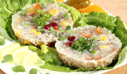 Meat with vegetables in jelly