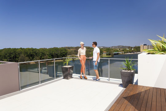 Attractive Couple On Balcony